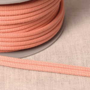 Double passepoil 518 Saumon C11 9mm 100%polyester le mètre