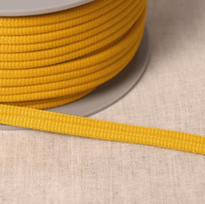 Double passepoil 518 jaune orange C152 9mm 100%polyester le mètre